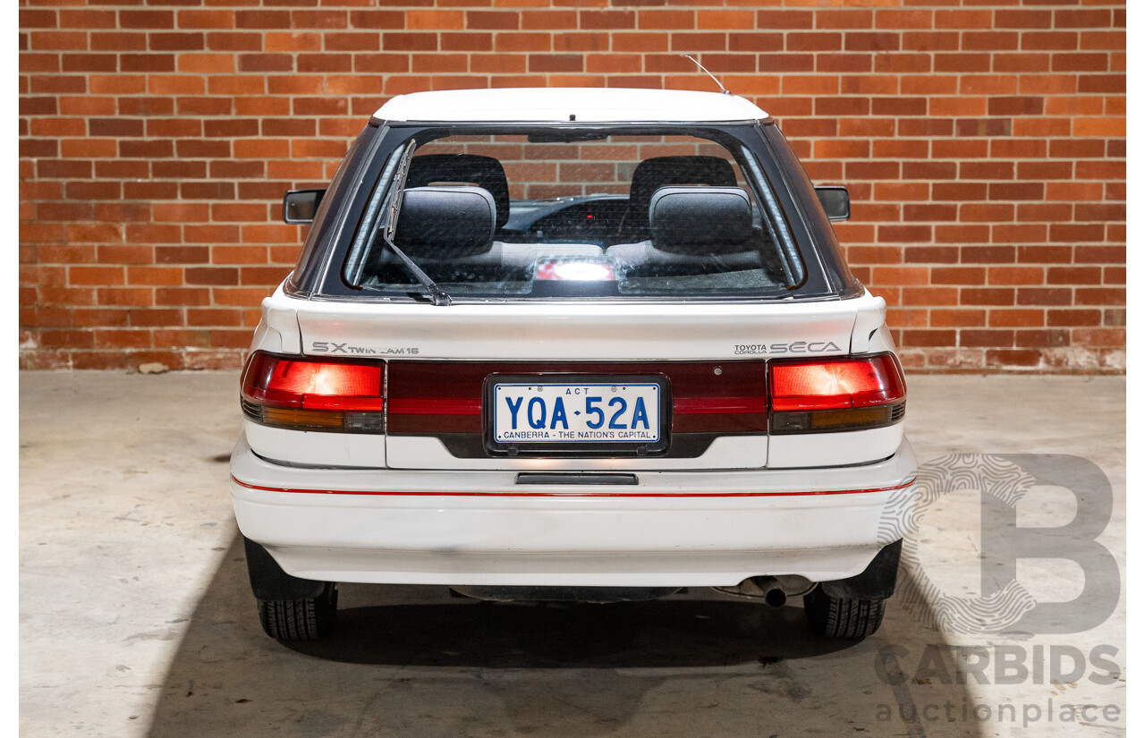 10/1990 Toyota Corolla SX SECA AE93 5d Liftback White 4A-GE 1.6L