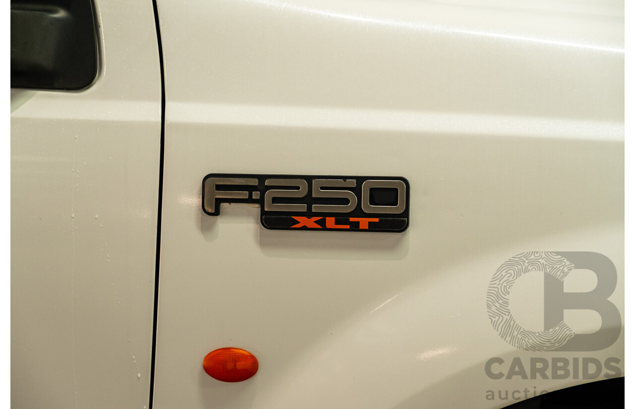 11/2005 Ford F250 XLT (4x4) RN 4d Crew Cab P/Up White Turbo Diesel V8 7.3L