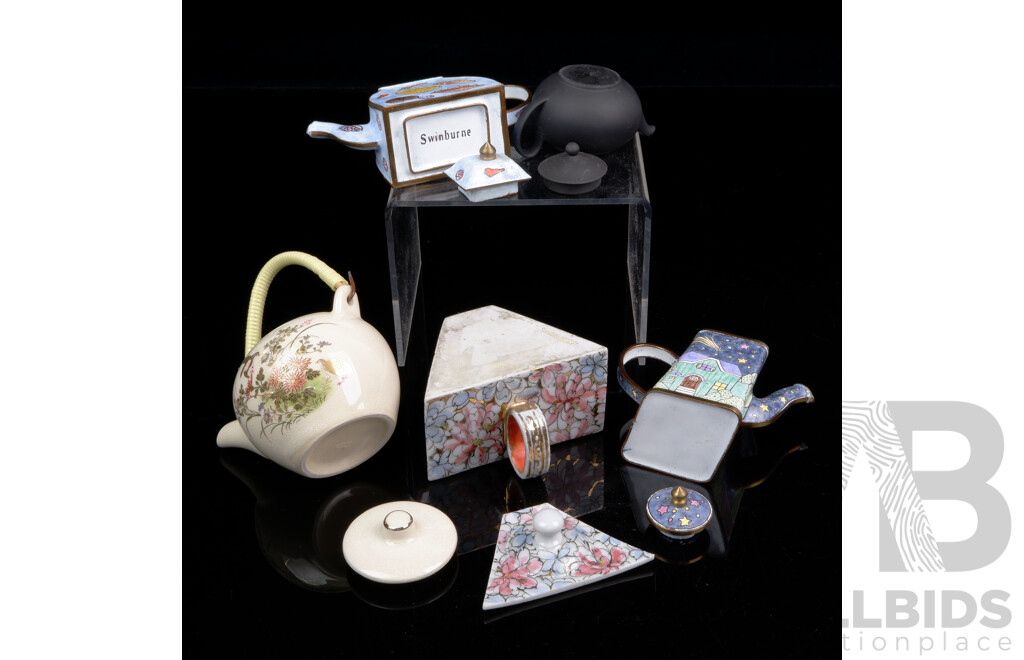 Collection Five Miniature Teapots Comprising Two Enameled Metal Examples, Black Wedgwood Example, Japanese Satsuma Example and Triangular Example with Floral Detail