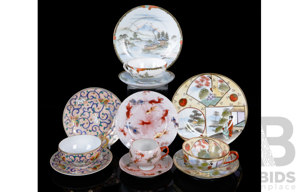 Collection Hand Painted Japanese Fine Porcelain Trios Including Example with Gold Fish Decoration