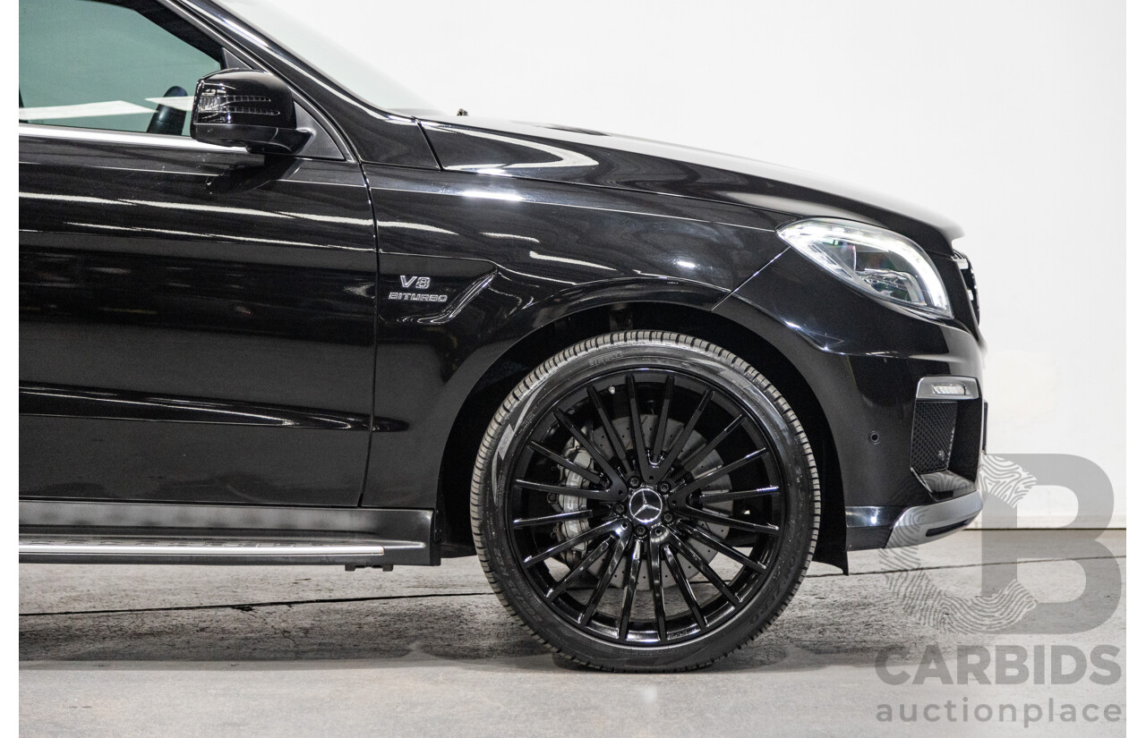 12/2013 Mercedes Benz ML63 AMG (AWD) 166 4d Wagon Obsidian Black Metallic Twin Turbo V8 5.5L