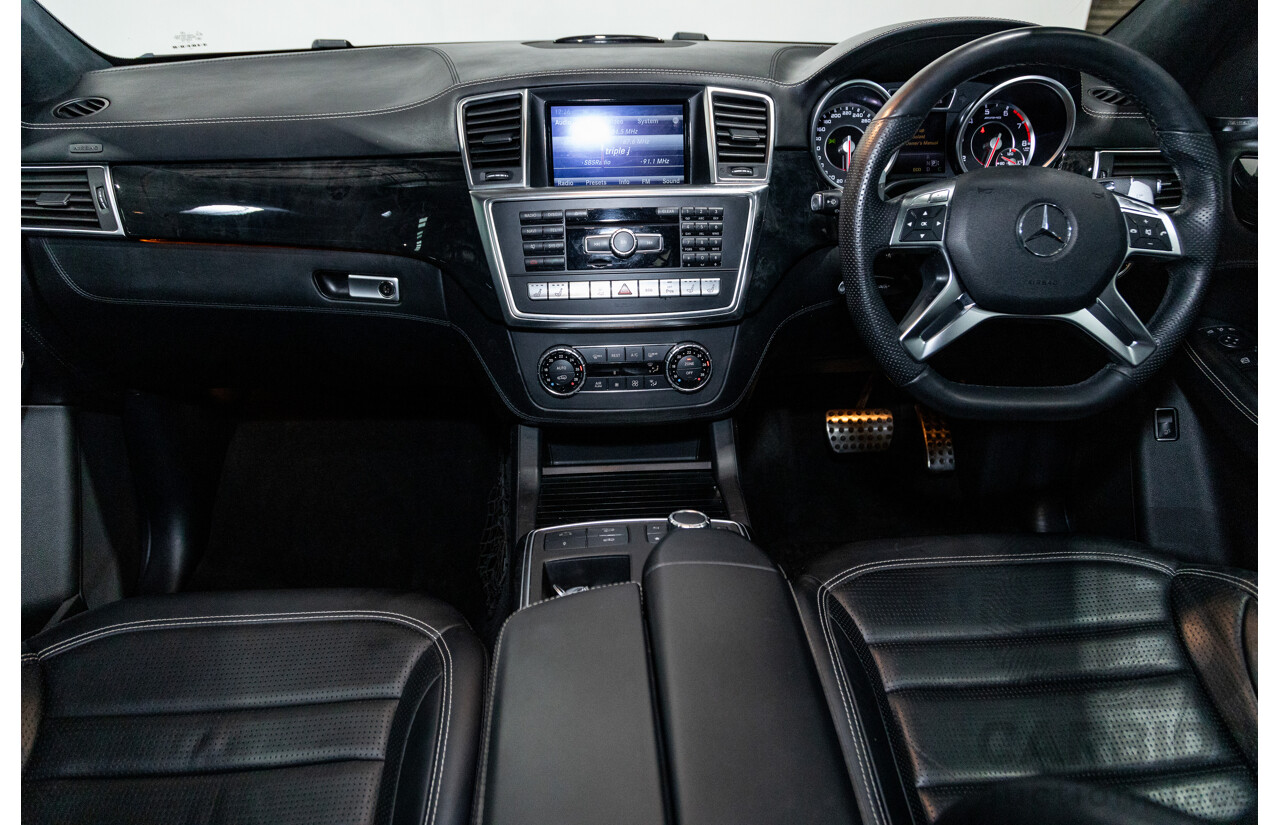12/2013 Mercedes Benz ML63 AMG (AWD) 166 4d Wagon Obsidian Black Metallic Twin Turbo V8 5.5L