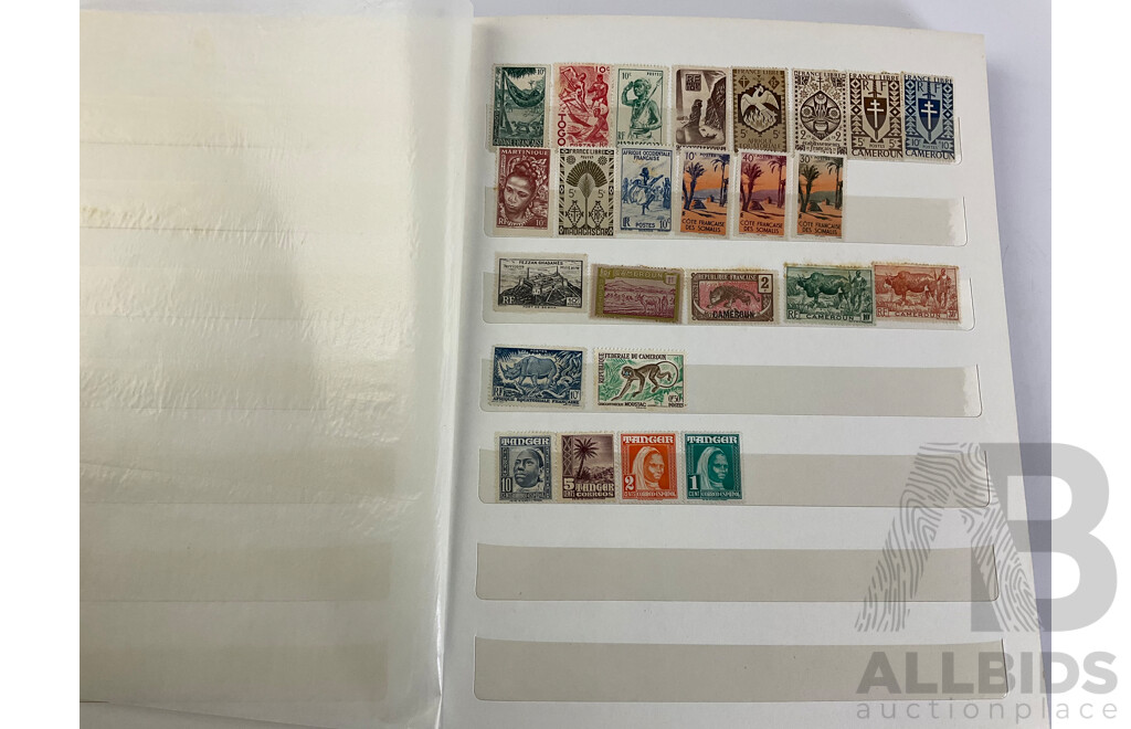 Two Albums of Vintage International Stamps Including Mongolia, Monaco, Panama, Dubai, Cayman Islands, Fiji,  Canada, Hong Kong, China, France, Cameroon, India, Thailand, Spain, Norway, Netherlands, Denmark
