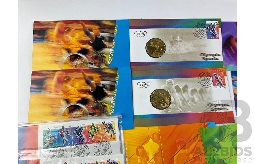 Collection of Australian Sydney 2000 Olympics Philatelic Memorabilia Including Two Five Dollar Coin PNCs, Paralympics Stamp Packs, Sealed FDCs, Prepaid Airmail Post Cards