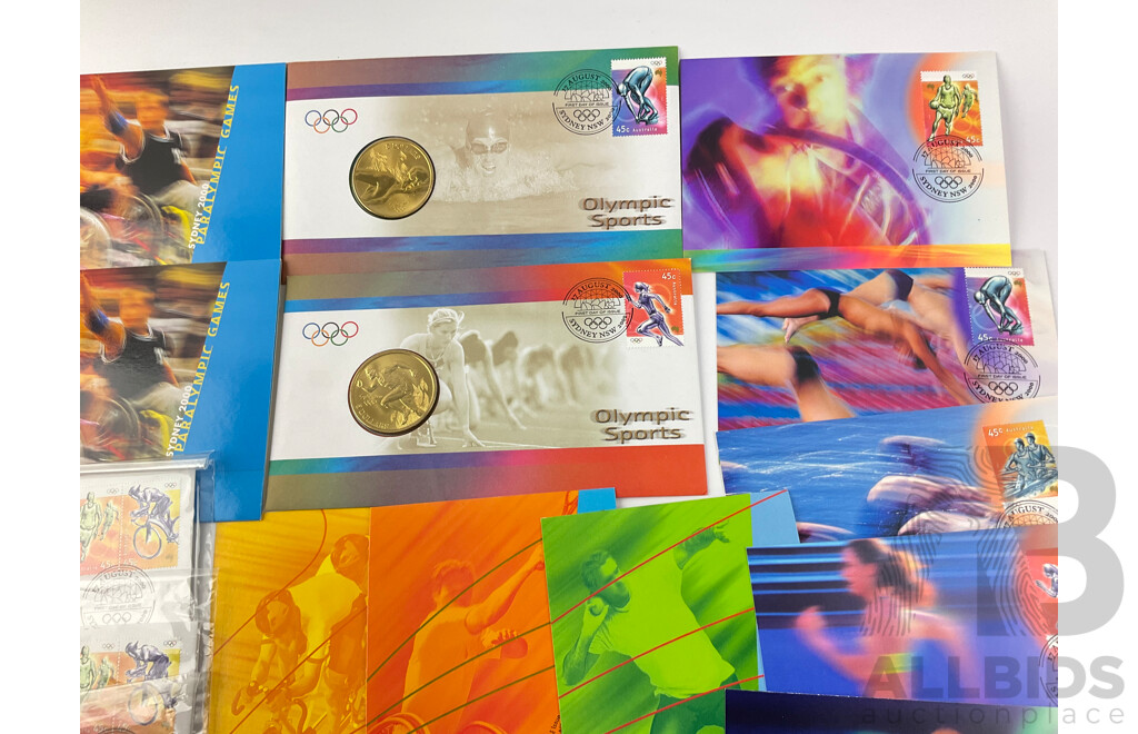 Collection of Australian Sydney 2000 Olympics Philatelic Memorabilia Including Two Five Dollar Coin PNCs, Paralympics Stamp Packs, Sealed FDCs, Prepaid Airmail Post Cards