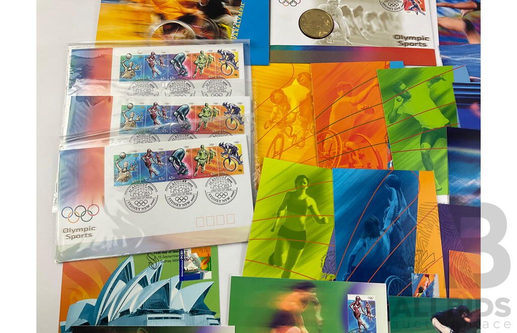 Collection of Australian Sydney 2000 Olympics Philatelic Memorabilia Including Two Five Dollar Coin PNCs, Paralympics Stamp Packs, Sealed FDCs, Prepaid Airmail Post Cards