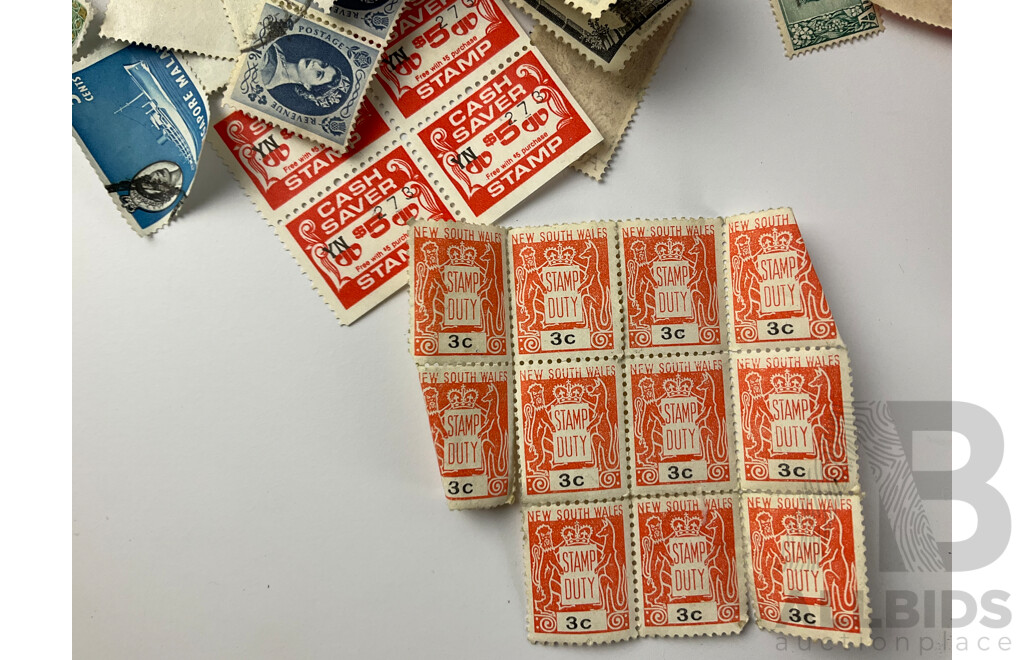 Collection of Cancelled International Stamps Including Australian Predecimal, Britain, Phillipines and More with Embassy Stamp Album