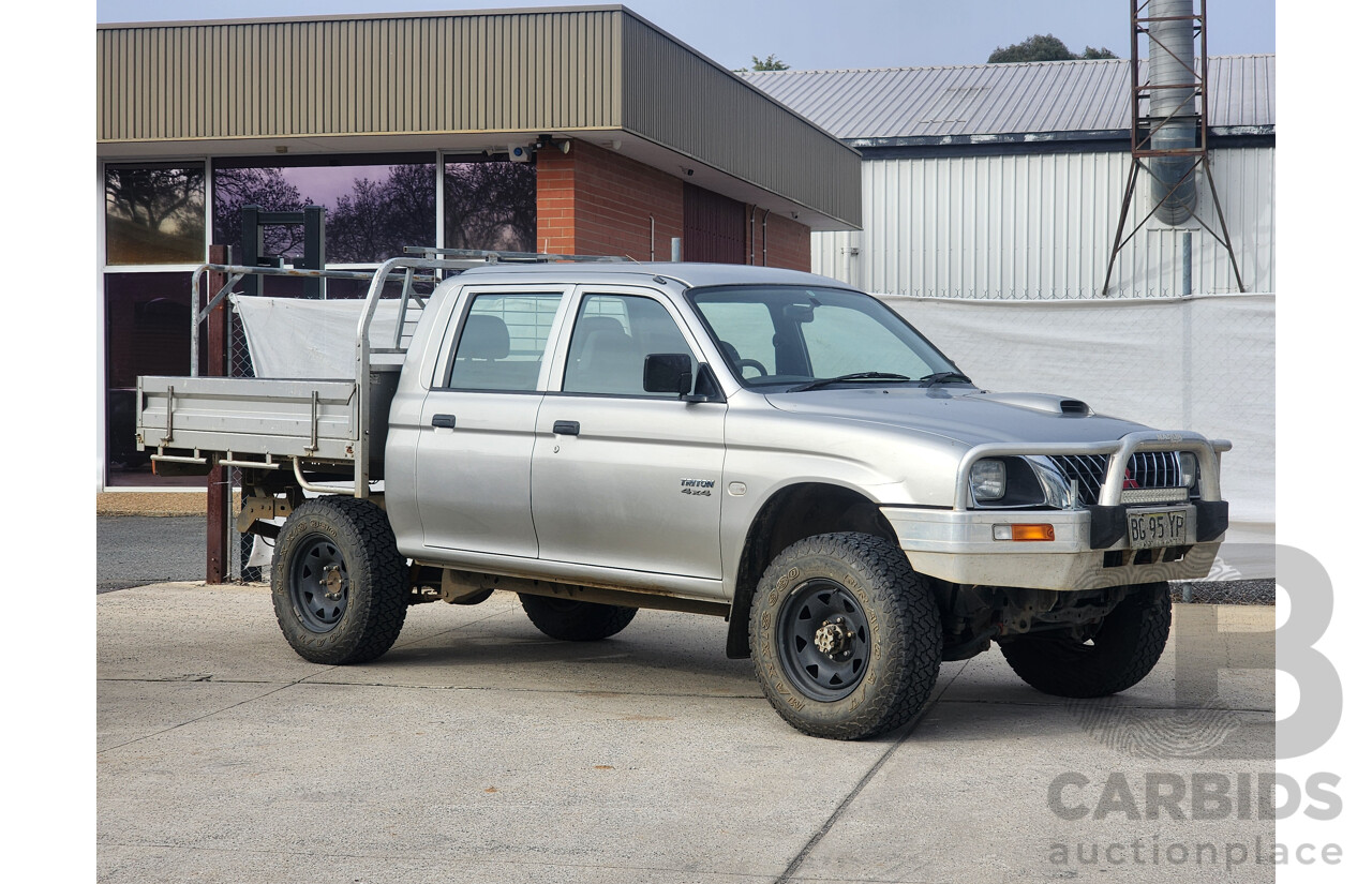 09/2004 Mitsubishi Triton GLX 4x4 MK MY04 Double Cab Utility Silver 2.8L