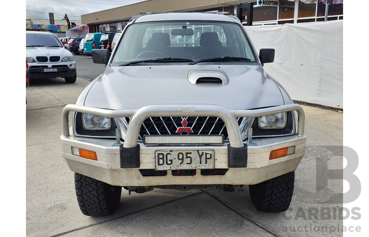 09/2004 Mitsubishi Triton GLX 4x4 MK MY04 Double Cab Utility Silver 2.8L