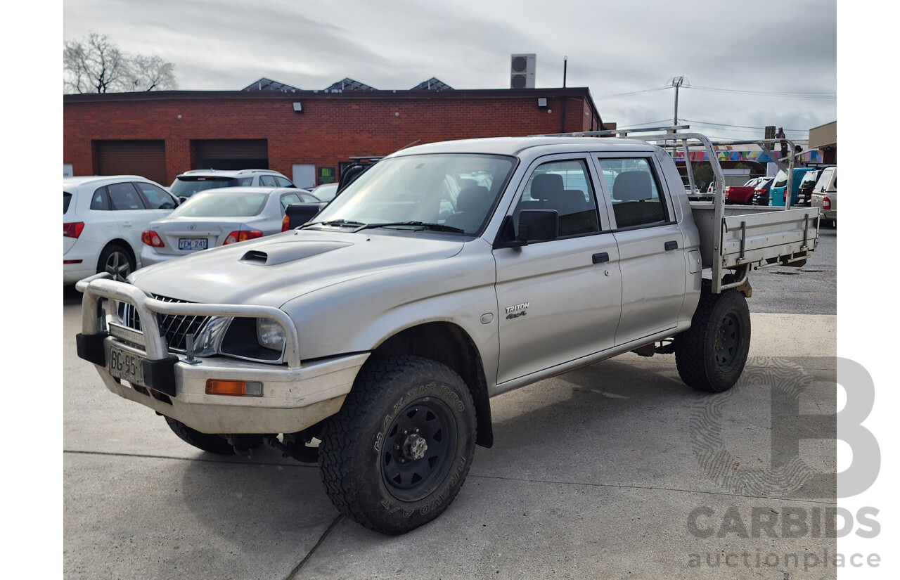 09/2004 Mitsubishi Triton GLX 4x4 MK MY04 Double Cab Utility Silver 2.8L