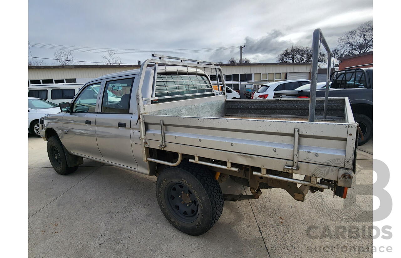 09/2004 Mitsubishi Triton GLX 4x4 MK MY04 Double Cab Utility Silver 2.8L