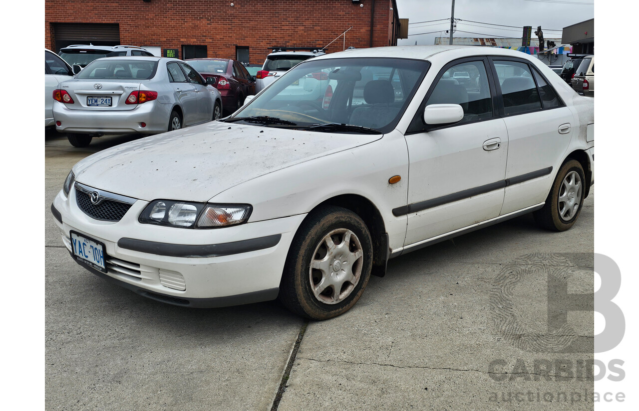3/1998 Mazda 626 Classic  4d Sedan White 2.0L