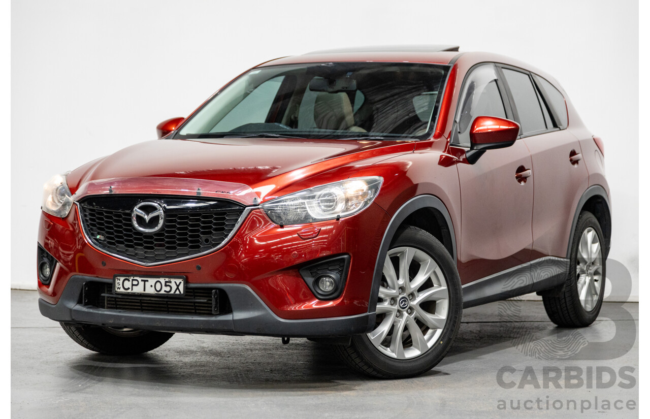 12/2012 Mazda CX-5 Grand Touring (AWD) 4d Wagon Zeal Red Turbo Diesel 2.2L