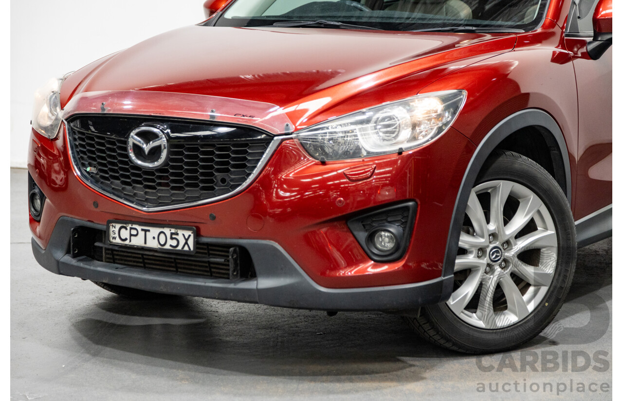 12/2012 Mazda CX-5 Grand Touring (AWD) 4d Wagon Zeal Red Turbo Diesel 2.2L