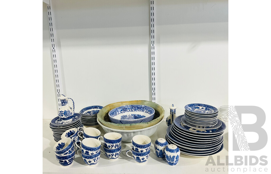 Collection of Pottery Kitchenware Including Several Plates of Different Sizes, Tea Cups, Salt and Pepper Shakers and Mlre