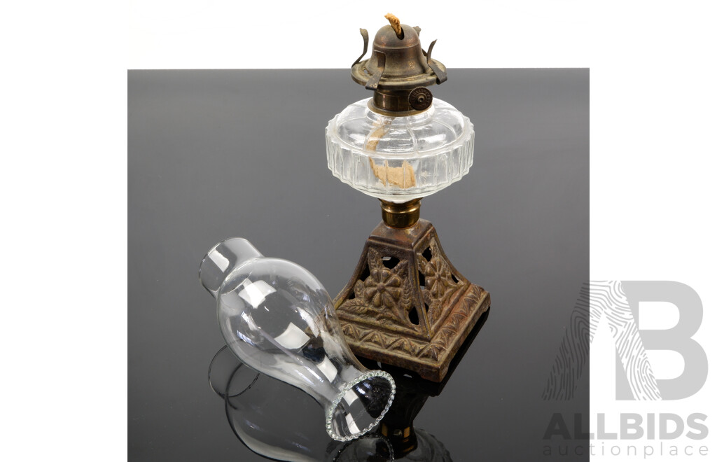 Antique Oil Lamp of Smaller Proportions with Ornate Cast Iron Base, Glass Font, with Glass Chimney with Ruffled Rim