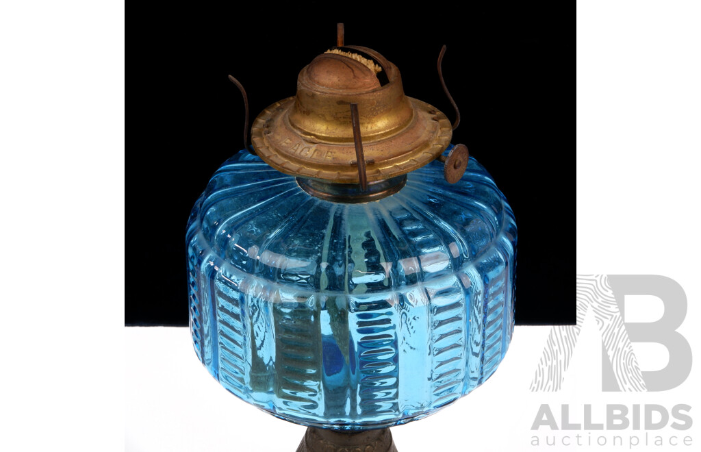 Antique American Eagle Oil Lamp with Ornate Cast Metal Base, Ribbed Blue Glass Font and Glass Flue