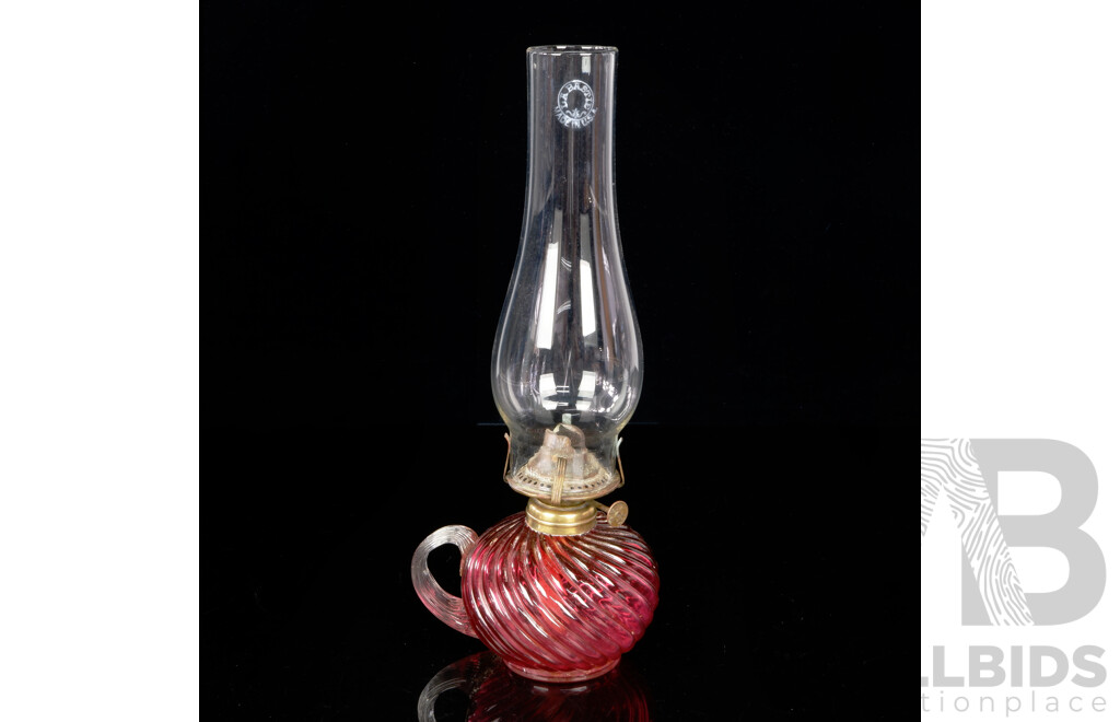 Antique USA Made Britelite Oil Lamp of Smaller Size with Cranberry Diagonally Ribbed Glass Font and Clear Flue