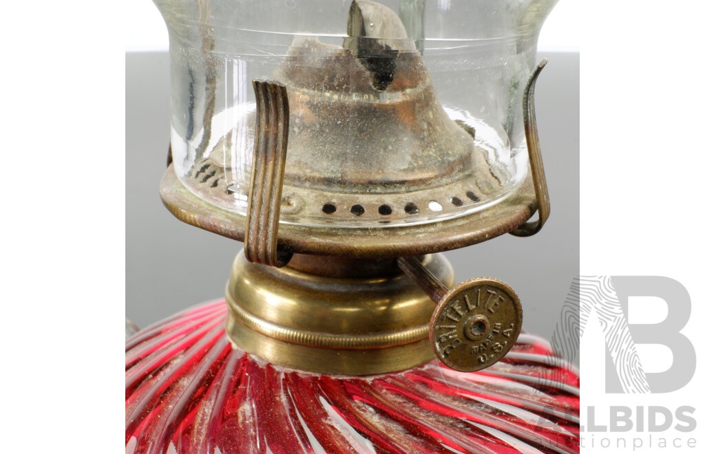 Antique USA Made Britelite Oil Lamp of Smaller Size with Cranberry Diagonally Ribbed Glass Font and Clear Flue