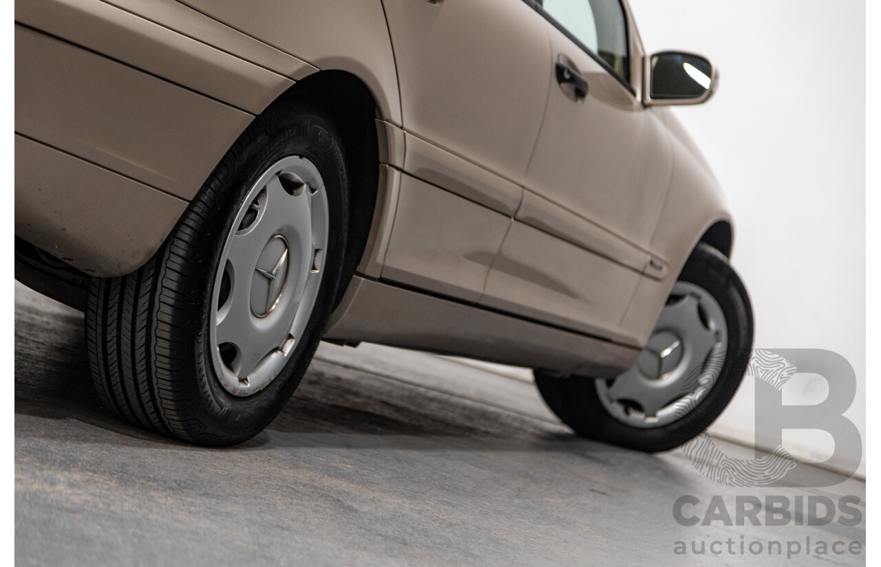 03/2003 Mercedes Benz C180 Kompressor Classic W203 4d Sedan Travertine Beige Metallic Supercharged 1.8L