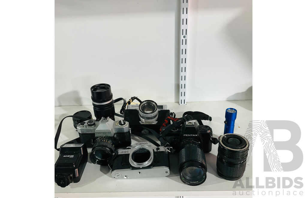 Collection of Vintage Film Cameras and Equipment Including Yashica TL-electro, Pentax P30, Minolta Hi-matic 9 and More