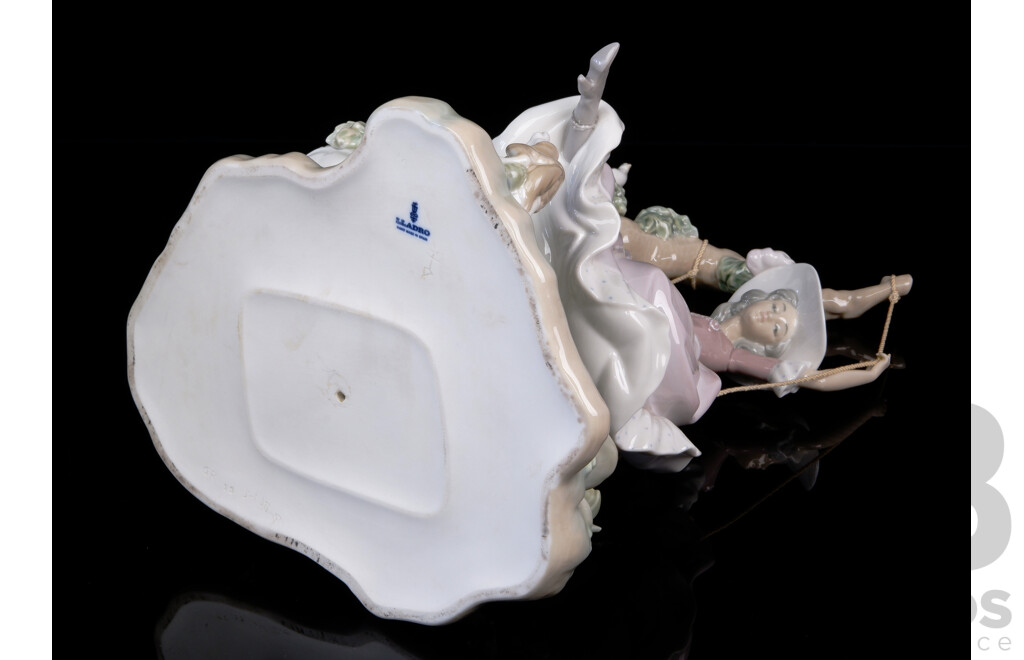 Elegant Large Retired Lladro Victorian Girl on Swing Porcelain Sculpture by Salvador Debon