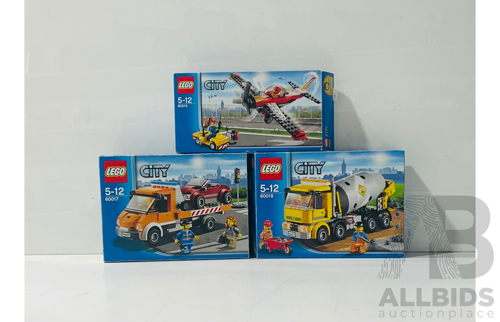 Collection of Three LEGO City Sets Including LEGO Stunt Plane 60019, LEGO Flatbed Truck 60017 and LEGO Cement Mixer 60018 Repackaged in Original Box