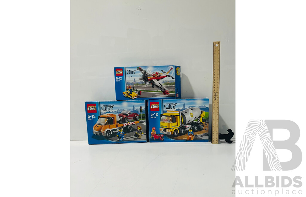 Collection of Three LEGO City Sets Including LEGO Stunt Plane 60019, LEGO Flatbed Truck 60017 and LEGO Cement Mixer 60018 Repackaged in Original Box