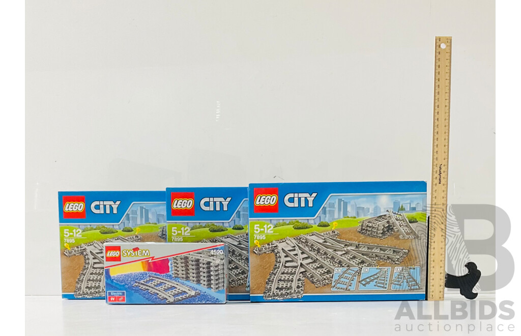 LEGO System Curved Rail Set 4520 and Three LEGO City Switching Train Tracks Set 7895 in Original Packaging