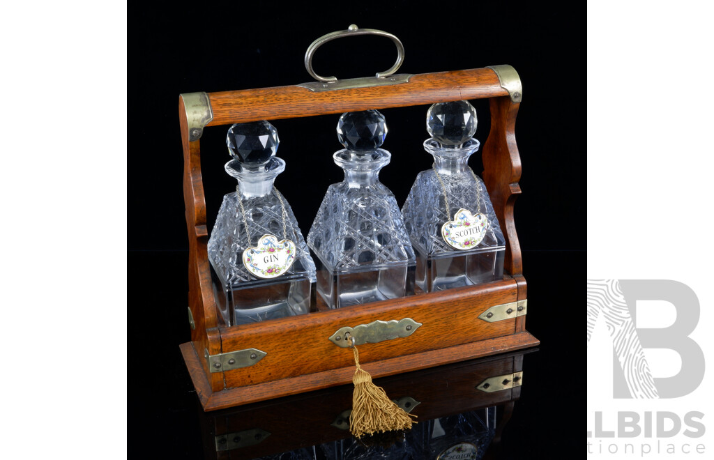 Antique Cedar Tantalus with Trio Matching Crystal Decanters & Stoppers, Brass Fittings, Lock & Key & Two Coalport Plaques