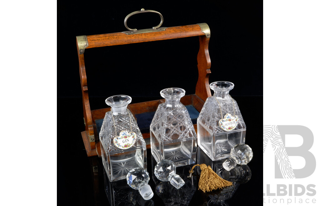 Antique Cedar Tantalus with Trio Matching Crystal Decanters & Stoppers, Brass Fittings, Lock & Key & Two Coalport Plaques