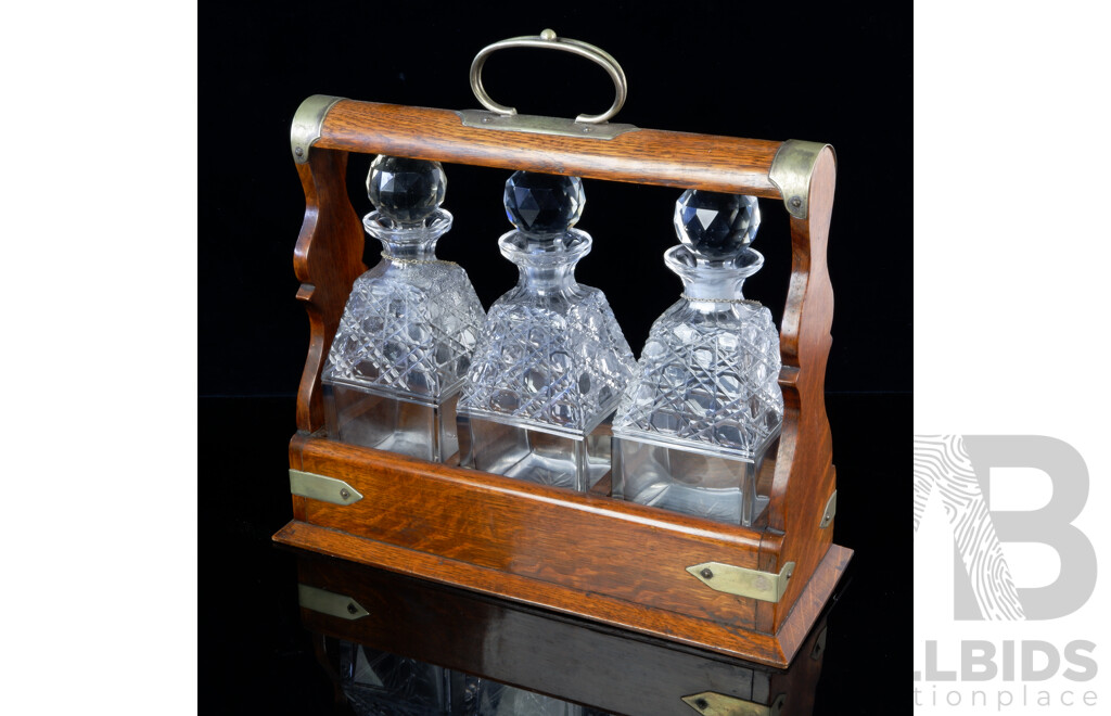 Antique Cedar Tantalus with Trio Matching Crystal Decanters & Stoppers, Brass Fittings, Lock & Key & Two Coalport Plaques