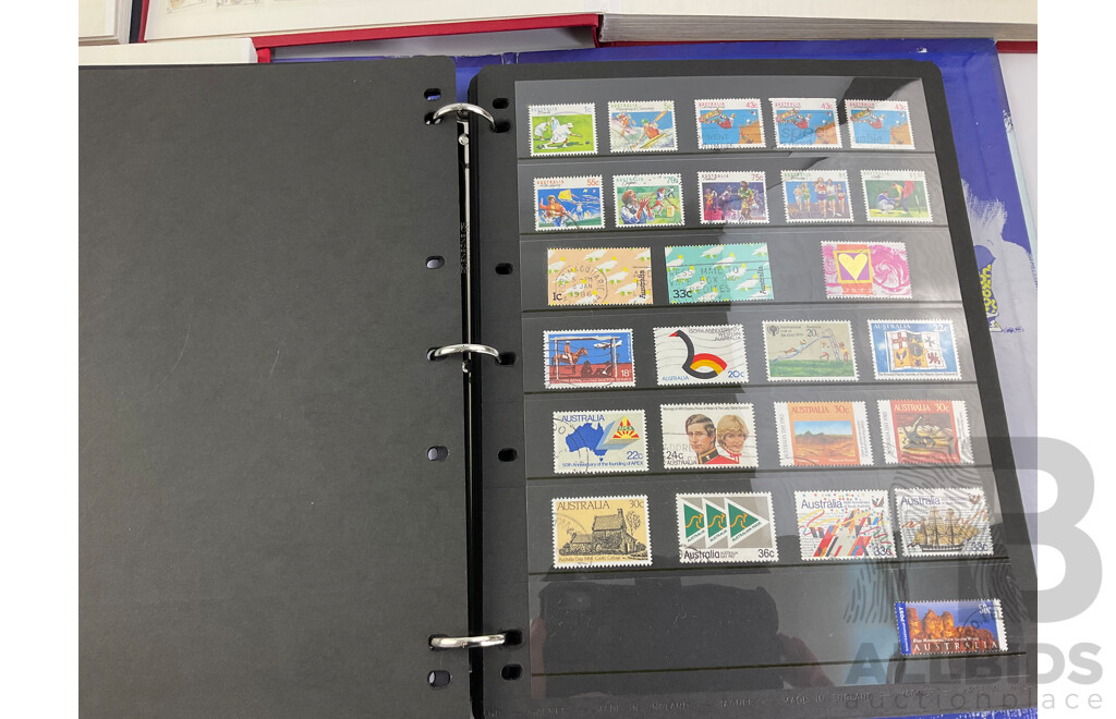 Four Albums of International Cancelled Stamps Including Ceylon, Vietnam, Australian Predecimal, Qatar, Mauritius, Sierra Leone, South Africa, Netherlands, France and More