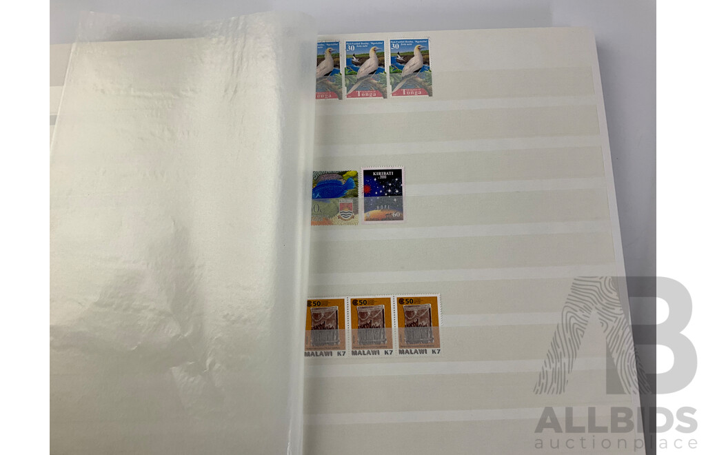 Four Albums of International Cancelled Stamps Including Ceylon, Vietnam, Australian Predecimal, Qatar, Mauritius, Sierra Leone, South Africa, Netherlands, France and More