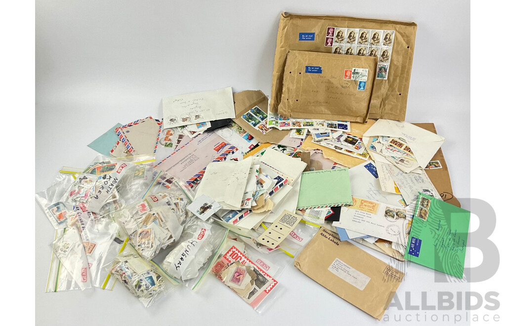 Collection of International Cancelled Stamps Including USSR, North Korea, Hungary, Japan, Australia, Mongolia, Guinea Equatorial, Vietnam, Maldives, Argentina, Madagascar, India and More