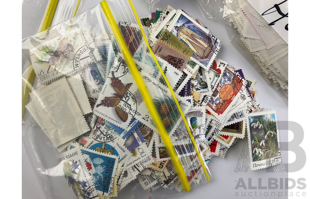 Collection of International Cancelled Stamps Including USSR, North Korea, Hungary, Japan, Australia, Mongolia, Guinea Equatorial, Vietnam, Maldives, Argentina, Madagascar, India and More