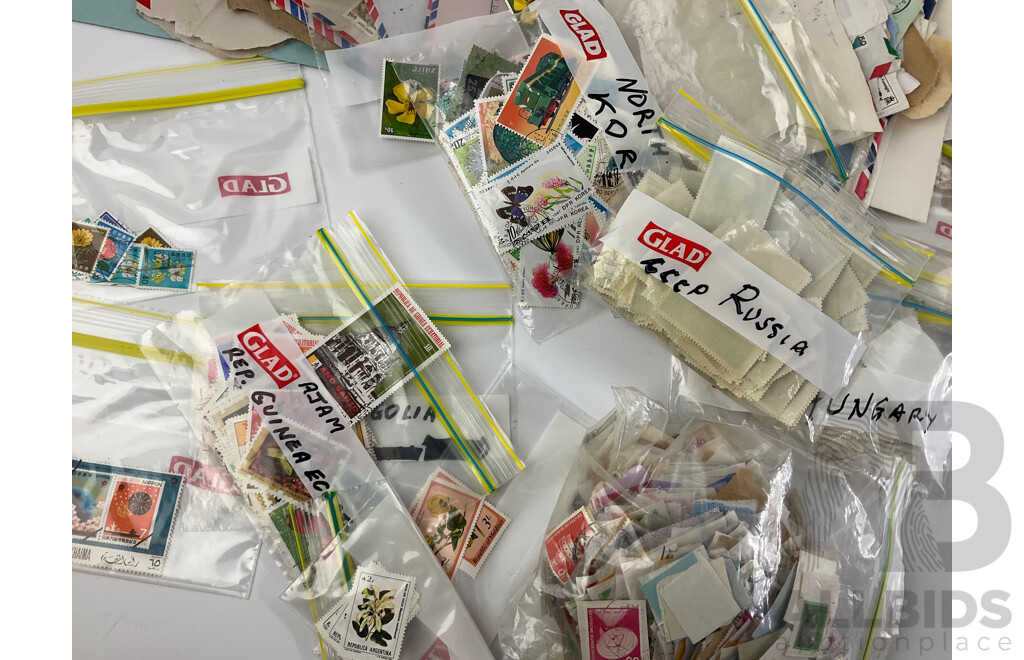Collection of International Cancelled Stamps Including USSR, North Korea, Hungary, Japan, Australia, Mongolia, Guinea Equatorial, Vietnam, Maldives, Argentina, Madagascar, India and More