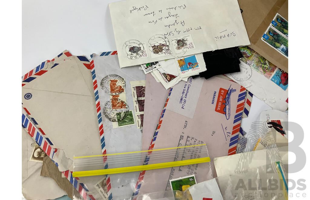 Collection of International Cancelled Stamps Including USSR, North Korea, Hungary, Japan, Australia, Mongolia, Guinea Equatorial, Vietnam, Maldives, Argentina, Madagascar, India and More