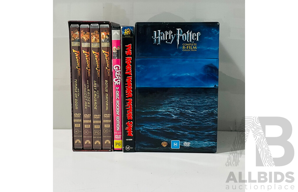 Collection of DvDs Including The Indiana Jones 1-3, Grease, The Rocky Horror Picture Show and the Complete Harry Potter Collection