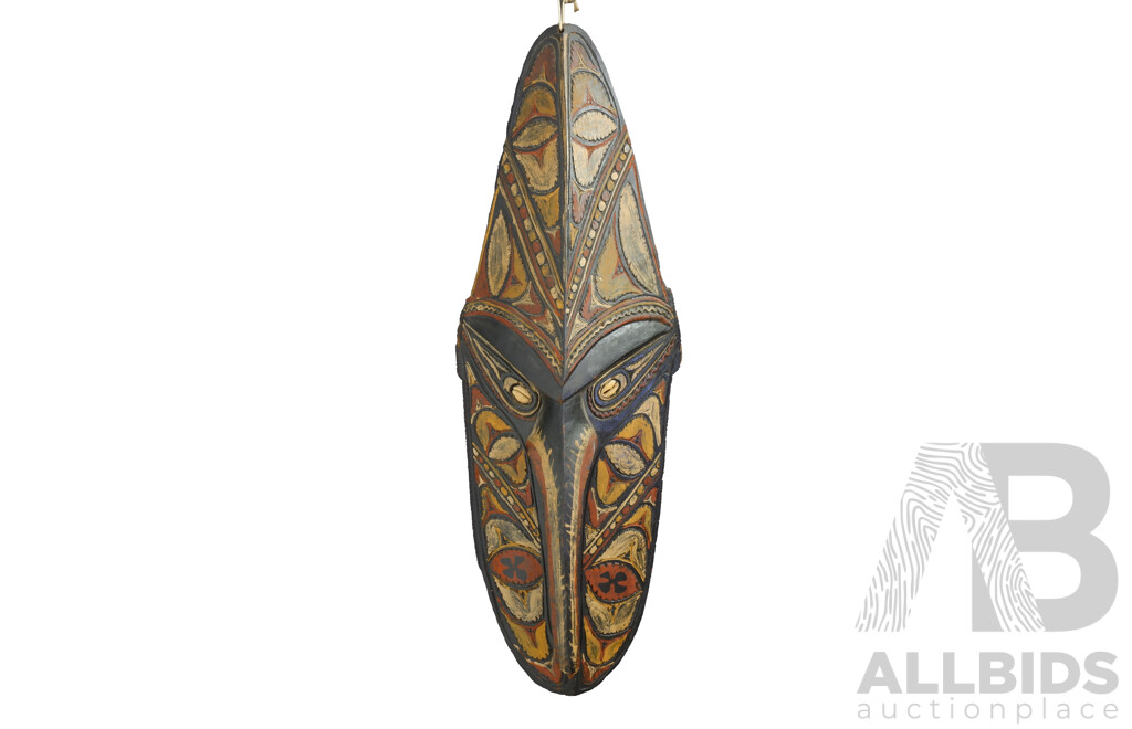 Large PNG Sepik River Carved Wooden Mask with Polychrome Decoration and Cowrie Shell Detail