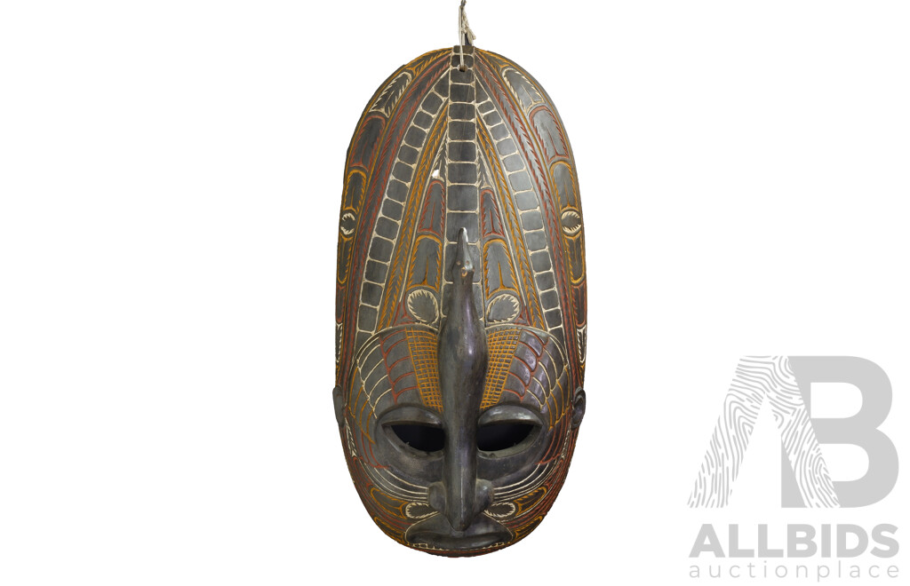 Large PNG Hand Carved Wooden Mask with Polychrome Decoration and Carved Bird Detail