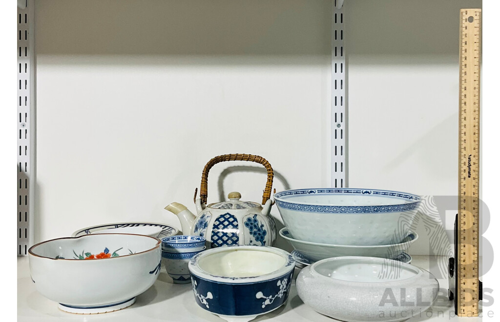 Collection of Asian Ceramics Including Bowls, Plates, a Teapot and More