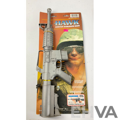 Two Vintage Sekiden Hawk Water Machine Guns Made in Japan and BCM Steel Wild West Badges