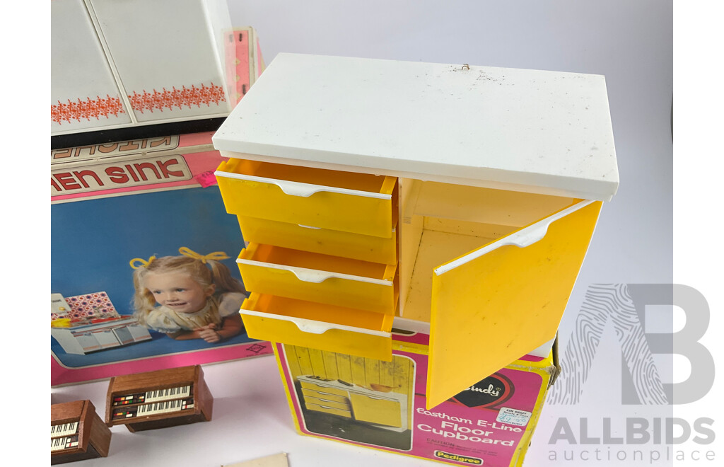 Collection of Vintage Dolls Furniture and Accessories Including Pedigree Sindy Floor Cupboard, Daiya Kitchen Sink, Timber Tables, Organs and Drawer Units and Caroline's Home Flower Planter, Most in Original Packaging