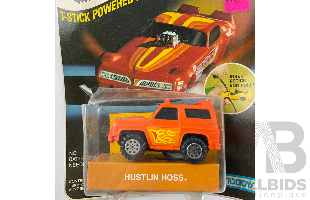 Two Vintage Toltoys T-zzzers T Stick Powered Racers, Blue Phantom and Hustlin Hoss in Original Packaging