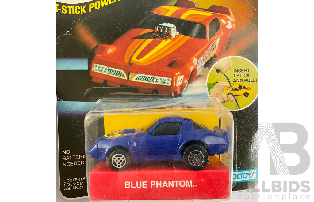 Two Vintage Toltoys T-zzzers T Stick Powered Racers, Blue Phantom and Hustlin Hoss in Original Packaging