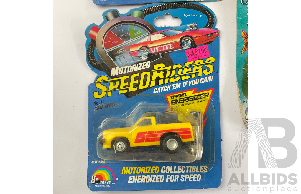 Three Vintage LJN Toys Including Rough Riders Water Divers Cuda, Motorized Speed Riders Baja Beast and 22 Caliber, All in Original Packaging