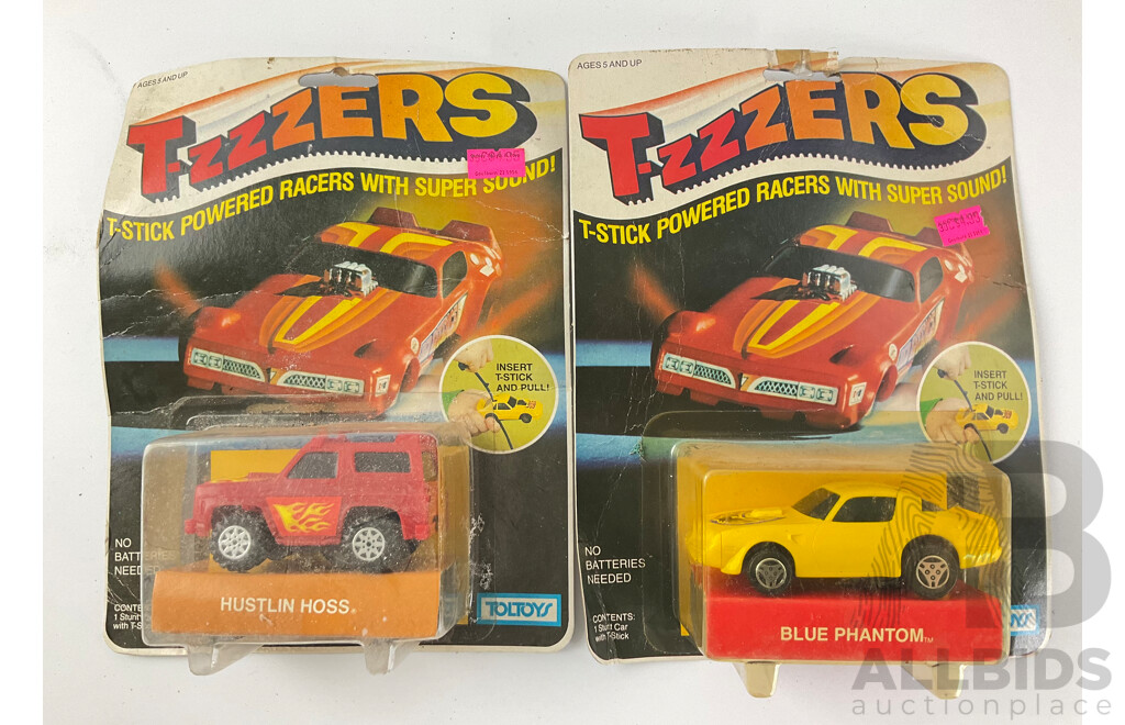 Two Vintage Toltoys T-zzzers T Stick Powered Racers, Blue Phantom and Hustlin Hoss in Original Packaging