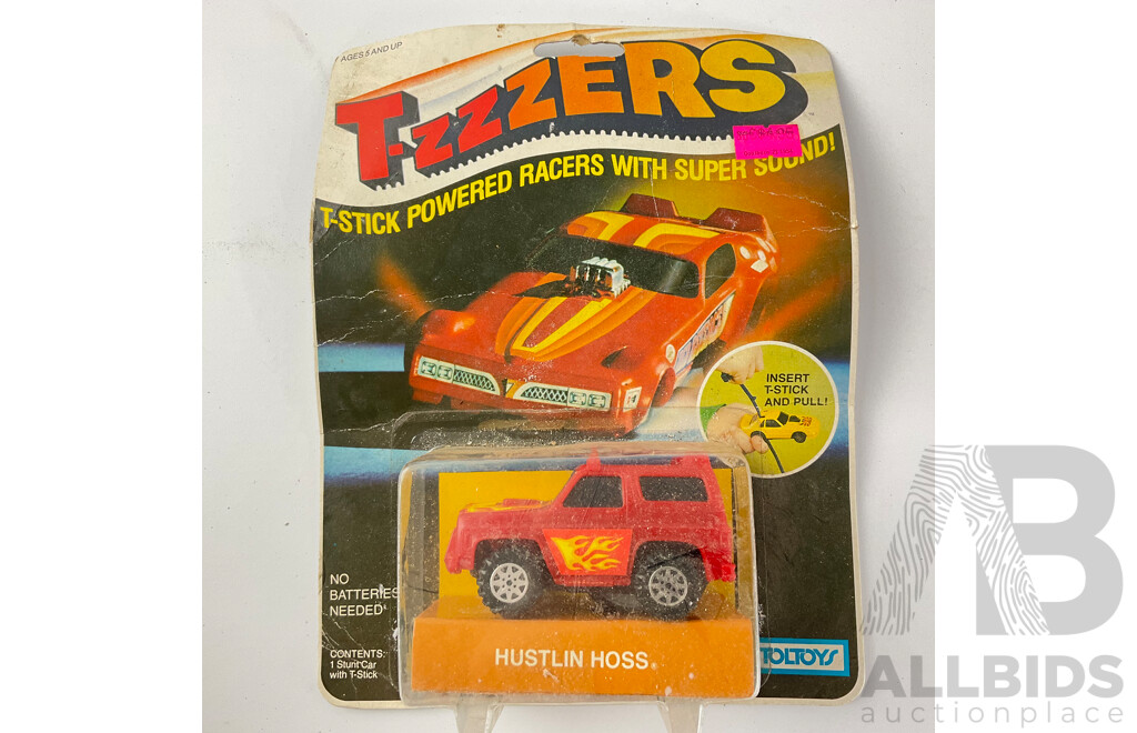 Two Vintage Toltoys T-zzzers T Stick Powered Racers, Blue Phantom and Hustlin Hoss in Original Packaging