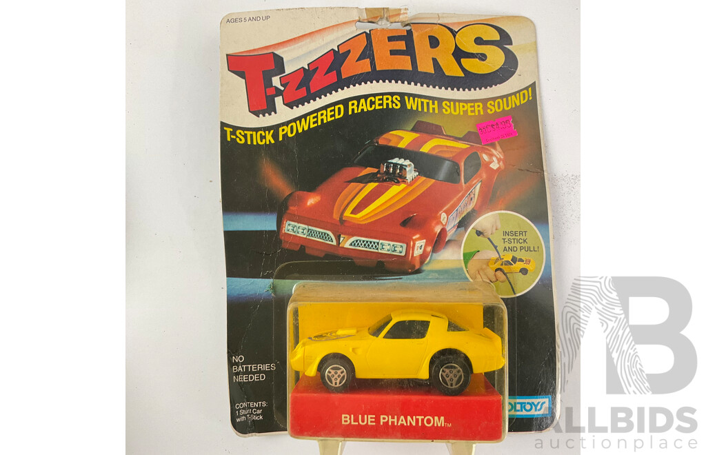 Two Vintage Toltoys T-zzzers T Stick Powered Racers, Blue Phantom and Hustlin Hoss in Original Packaging